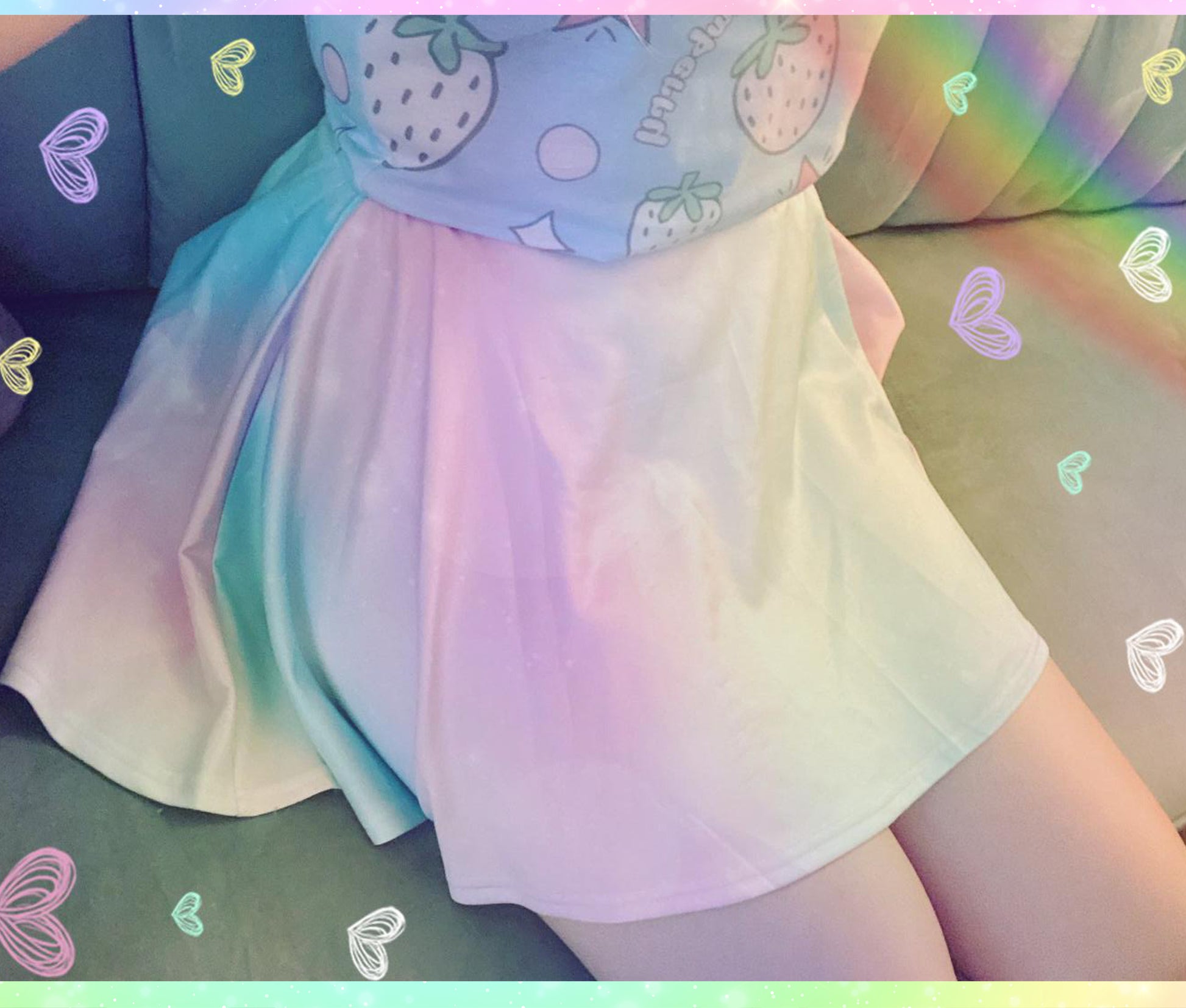 Young girl wearing a pastel kawaii skirt with rainbow print