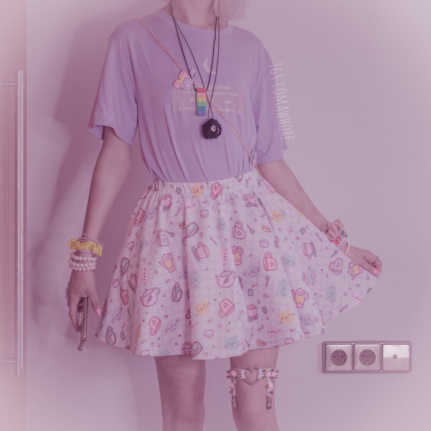  girl modeling a kawaii aesthetic t-shirt featuring playful, pastel artwork