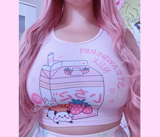 Happy girl dressed in Yume Kawaii Strawberry Milk Pink Crop Top