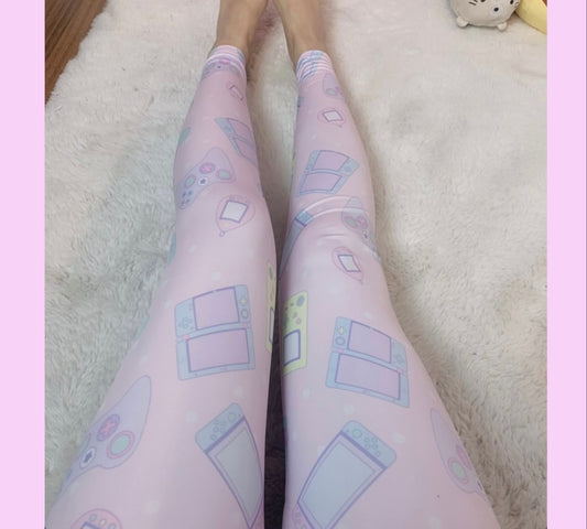  model wearing  cute pastel colours kawaii videogame leggings