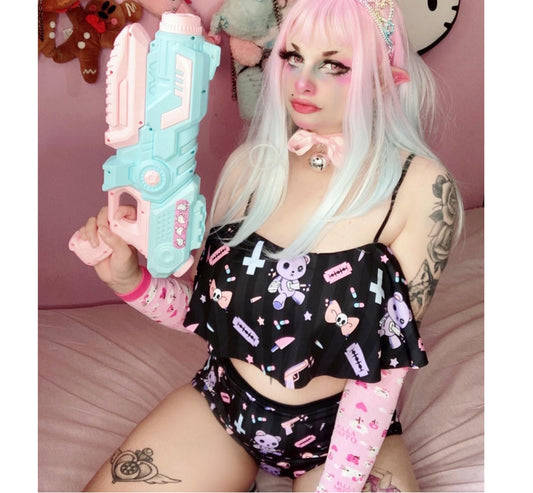 Model wearing a Yume Kawaii sick founce High Waisted Flounce Bikini Set feeling playful