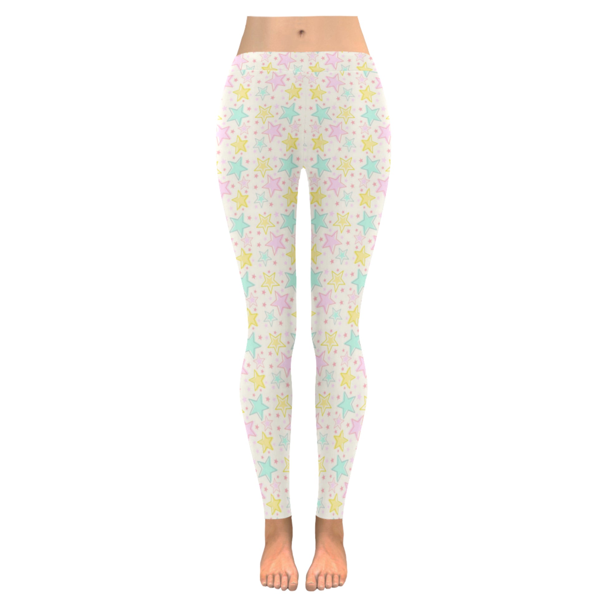 Youthful model wearing cute Yume Kawaii star leggings in pastel colours on white background