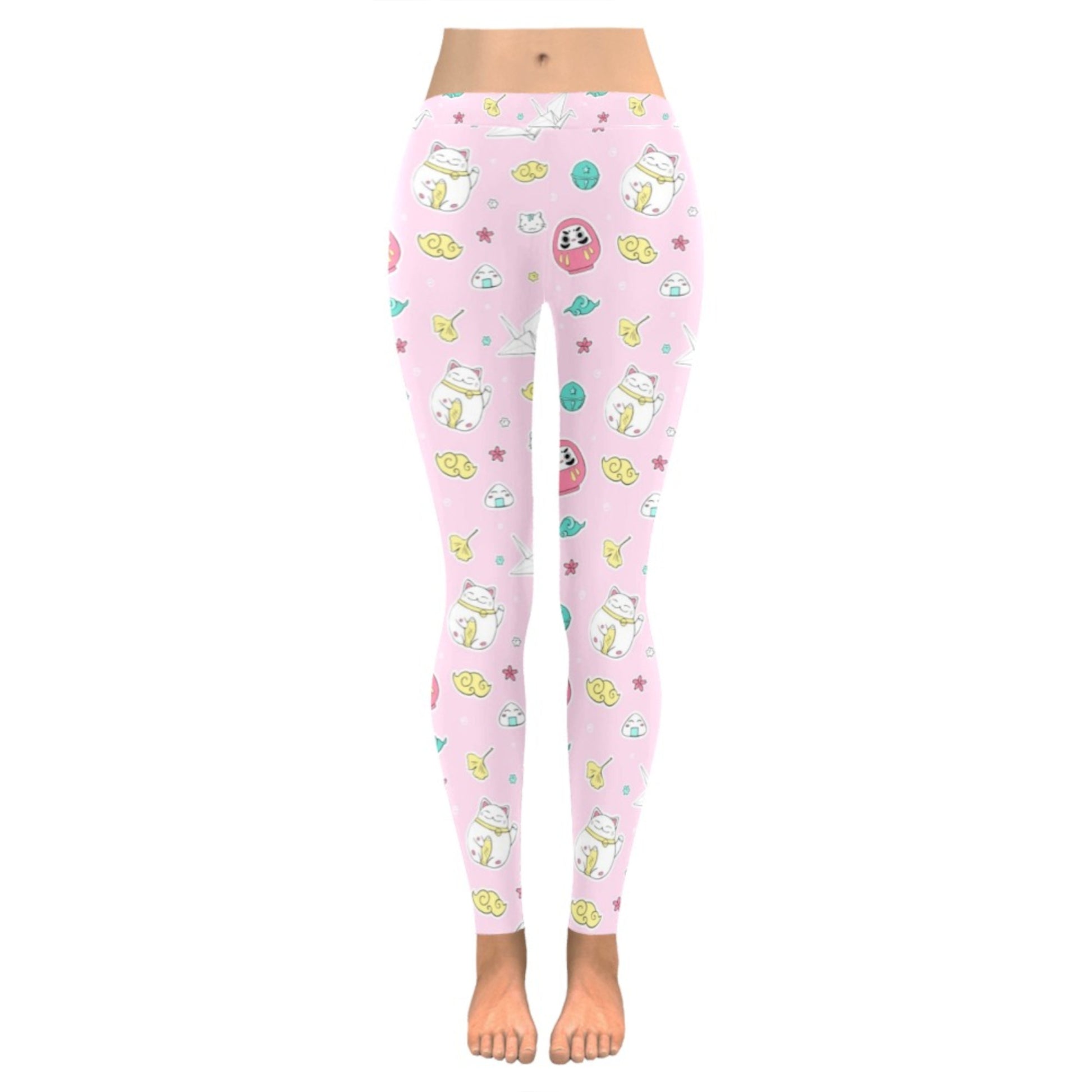 Pink pastel kawaii leggings displayed on clean white background.