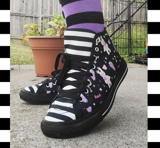Young girl wearing stylish, cute shoes with a playful  bunny design