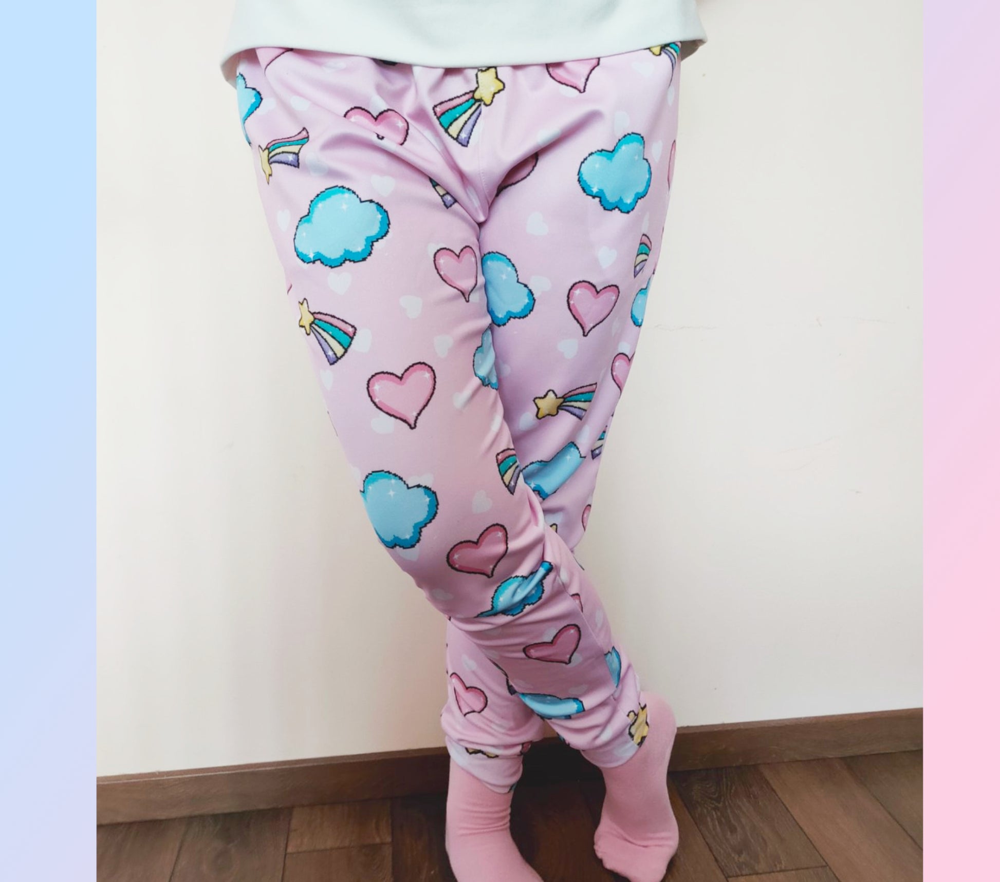 model wearing a pastel yume kawaii joggers  with a cute print