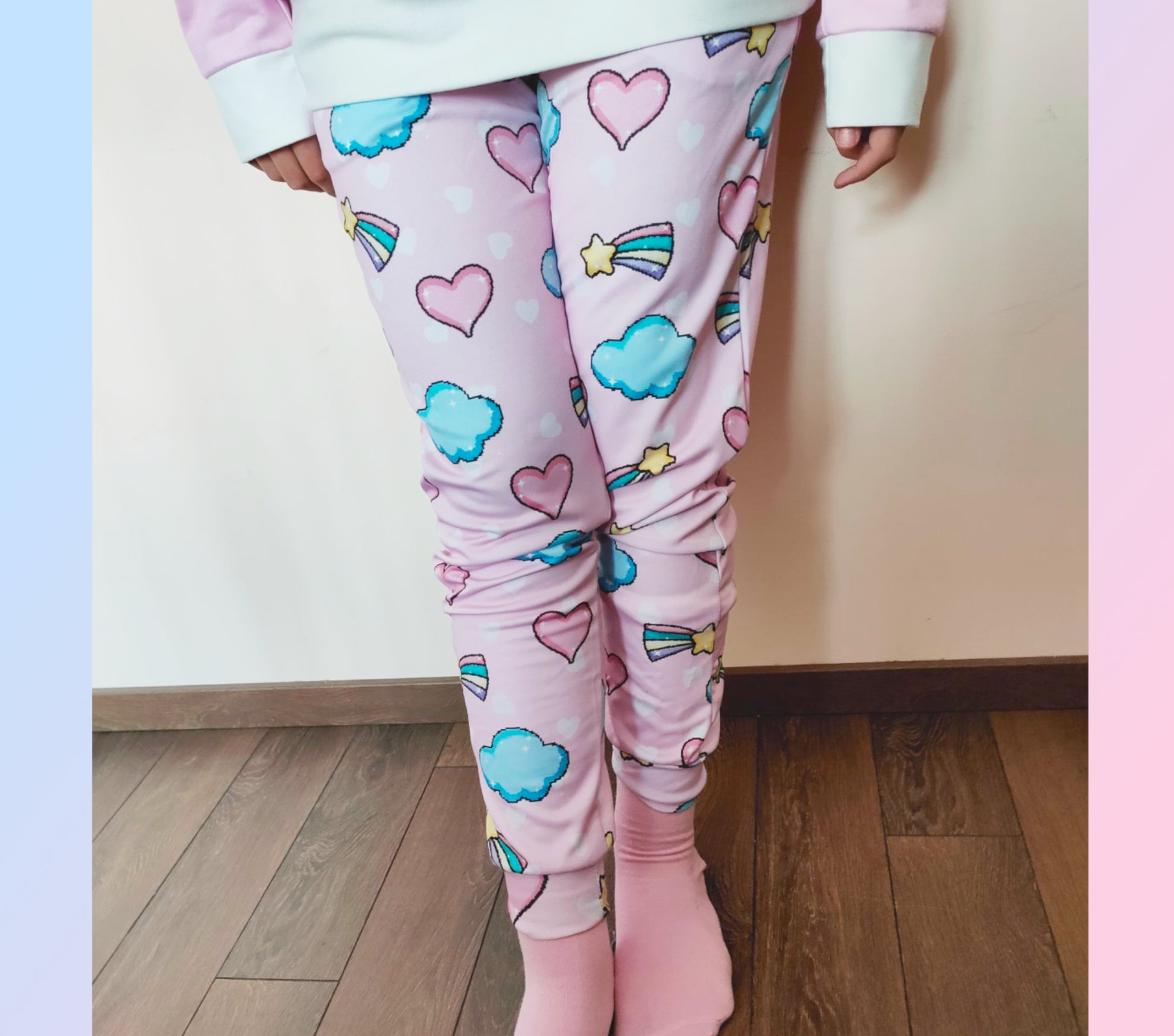 model wearing a pastel yume kawaii joggers  with a cute print