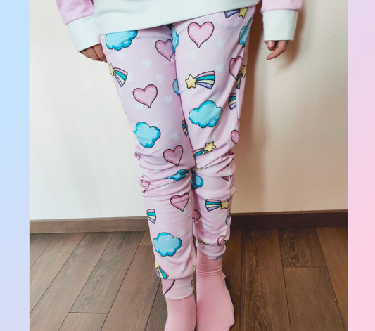 model wearing a pastel yume kawaii joggers  with a cute print