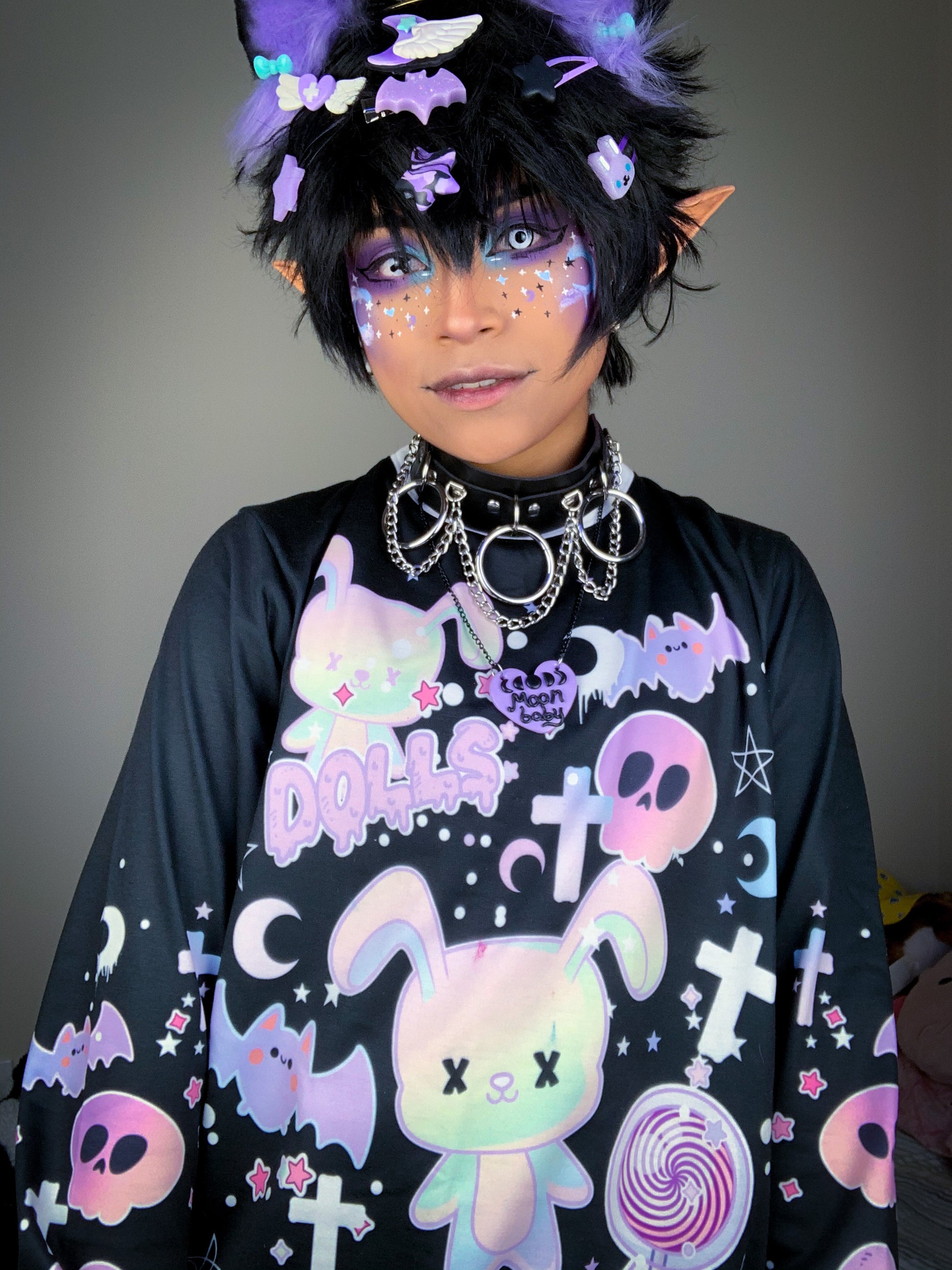 Youth model wearing a kawaii goth sweatshirt