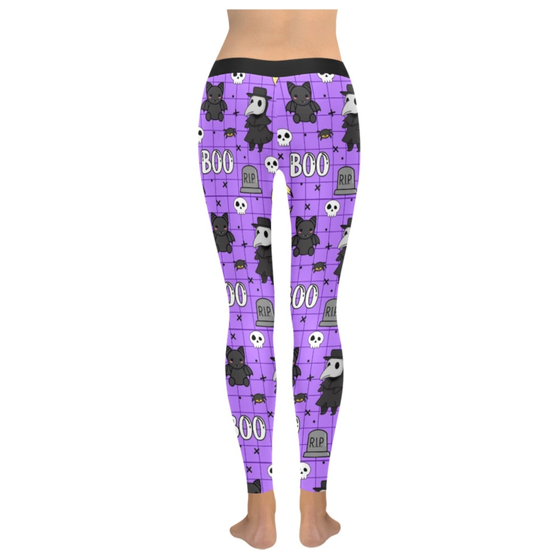 Purple leggings with Halloween-themed design on a white background