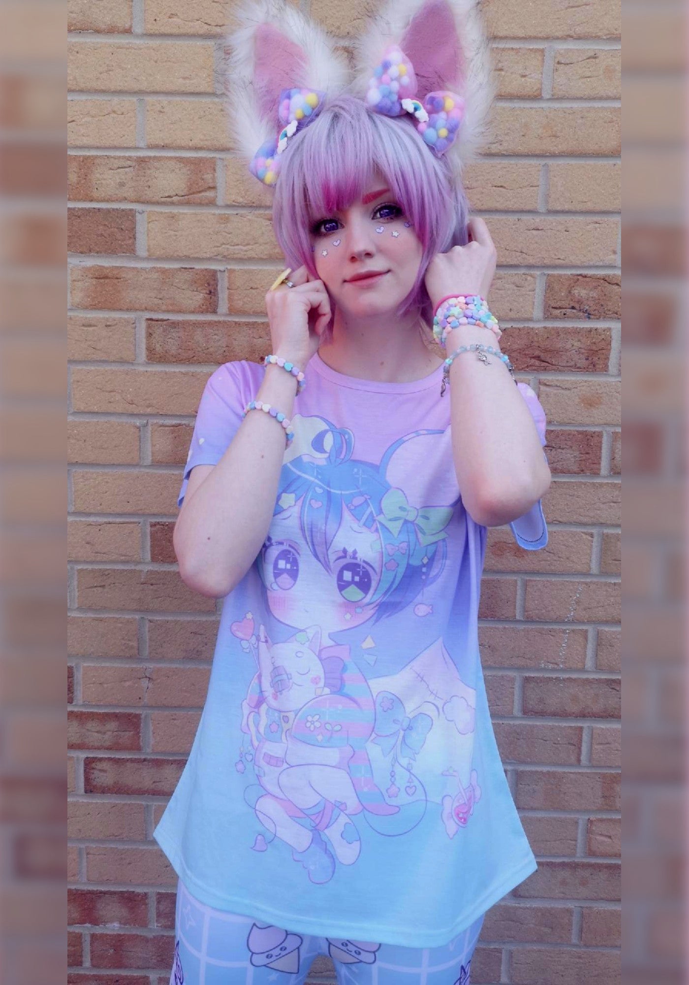 Teen girl in a kawaii graphic t-shirt with kawaii chibi design