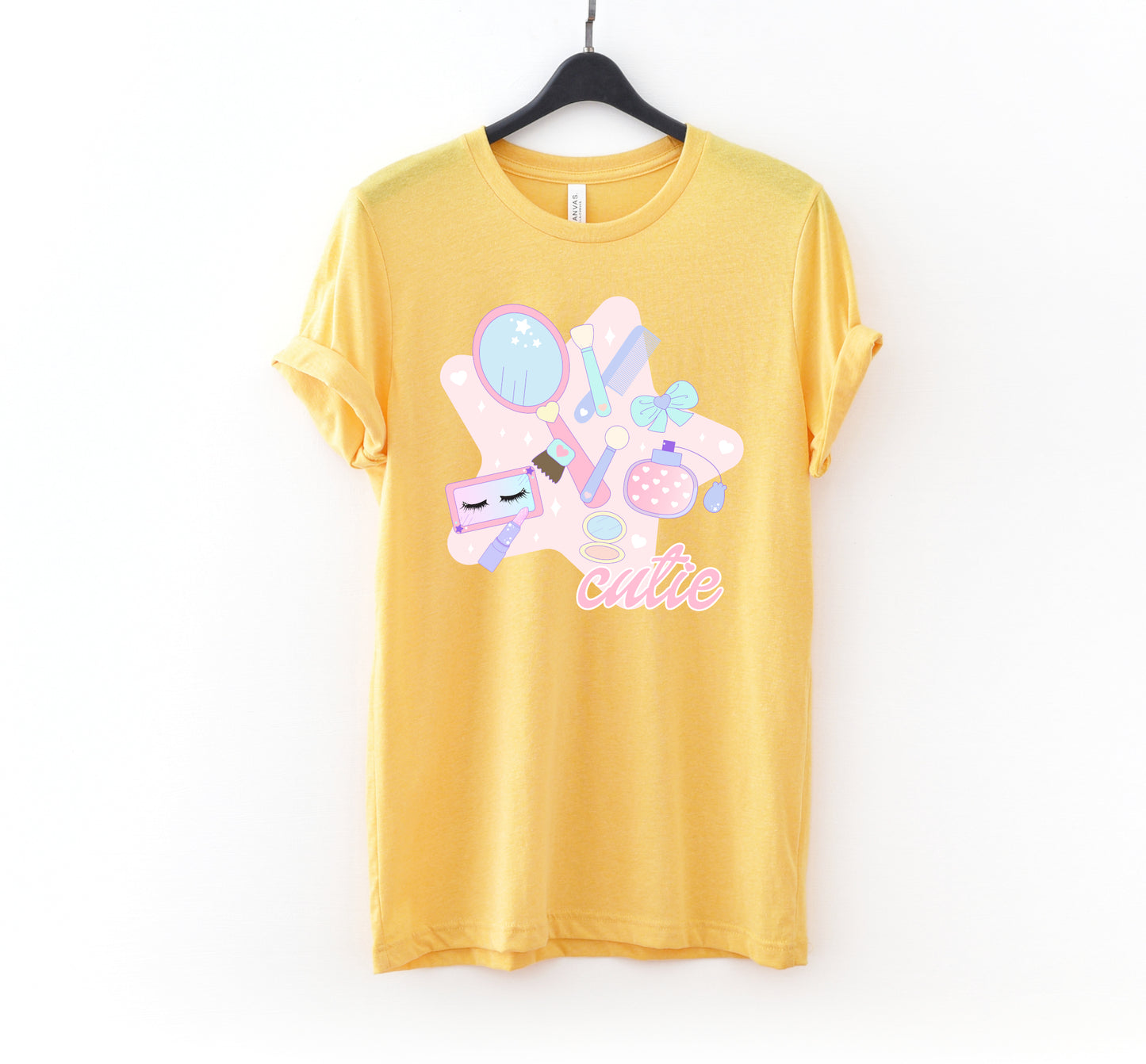 yellow pastel kawaii t-shirt displayed on clean white background.