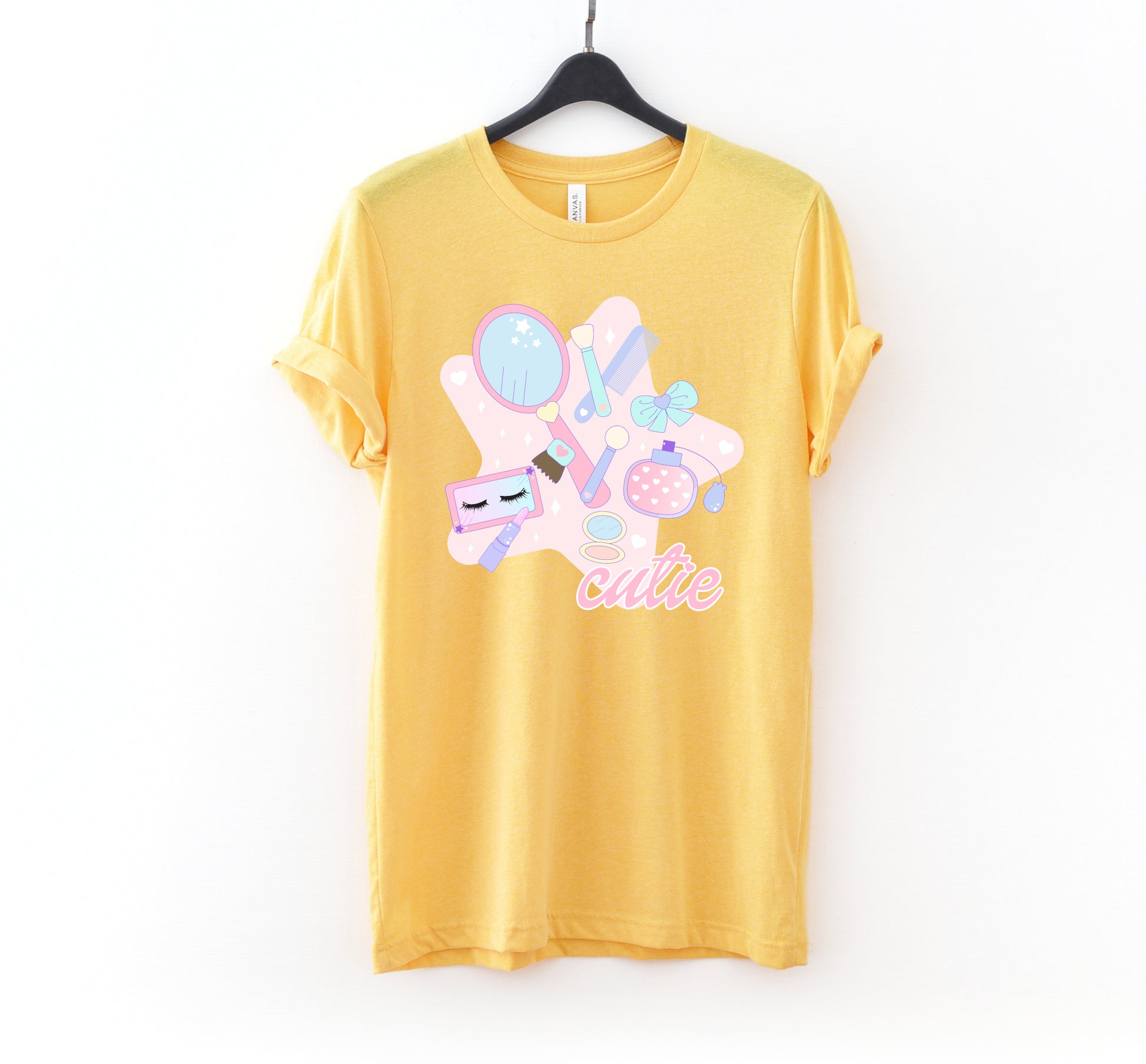 yellow pastel kawaii t-shirt displayed on clean white background.