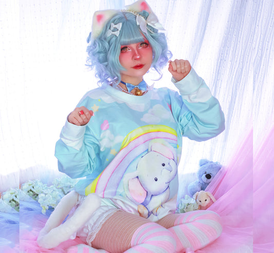 Youthful model wearing a  Enchanted Fairy Kei Yume Kawaii Elephant Sweatshirt
