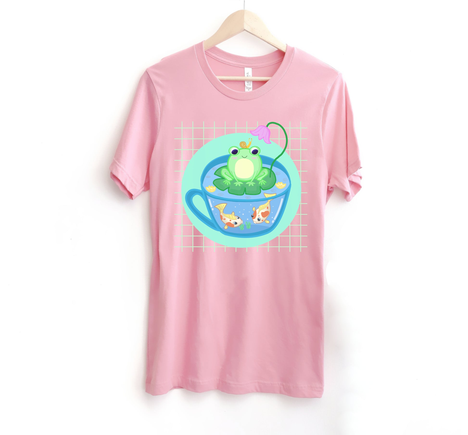 Pink Frog kawaii t-shirt displayed on clean white background.