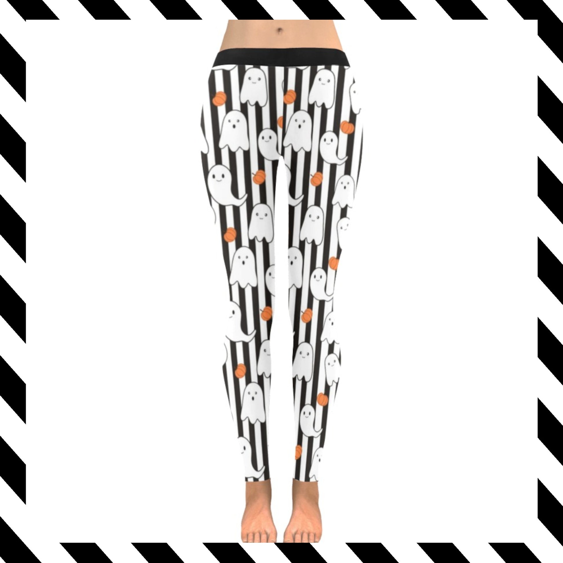 Leggings with ghost and candy corn pattern on a black and white striped background