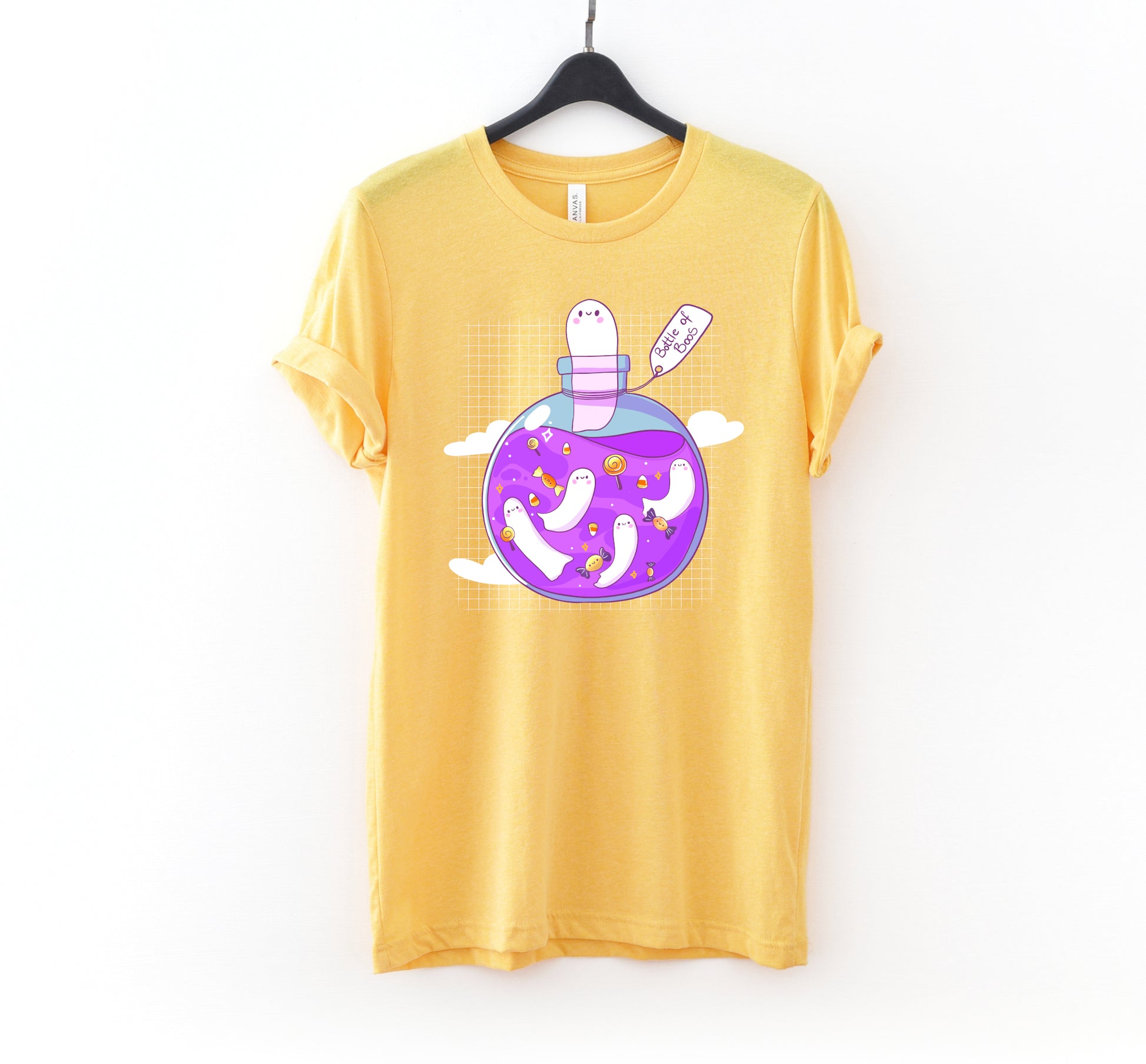 Yellow t-shirt with Halloween ghost design on a white background