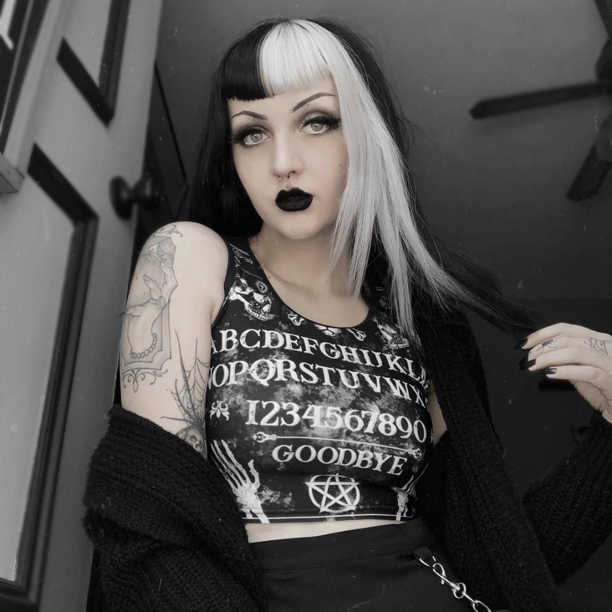 Gothic crop top featuring Ouija board design, perfect for Nu Goth and Halloween outfits