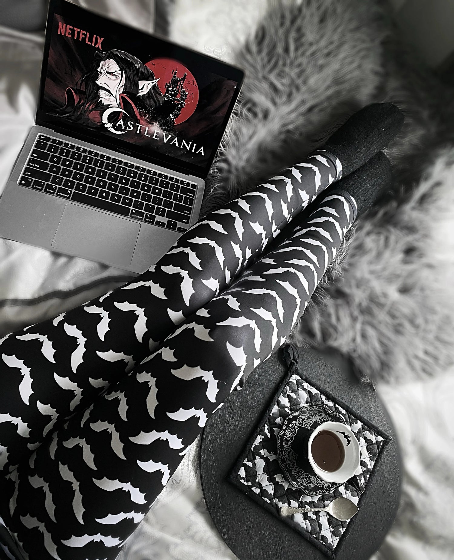 Youth model wearing   goth  bat leggings