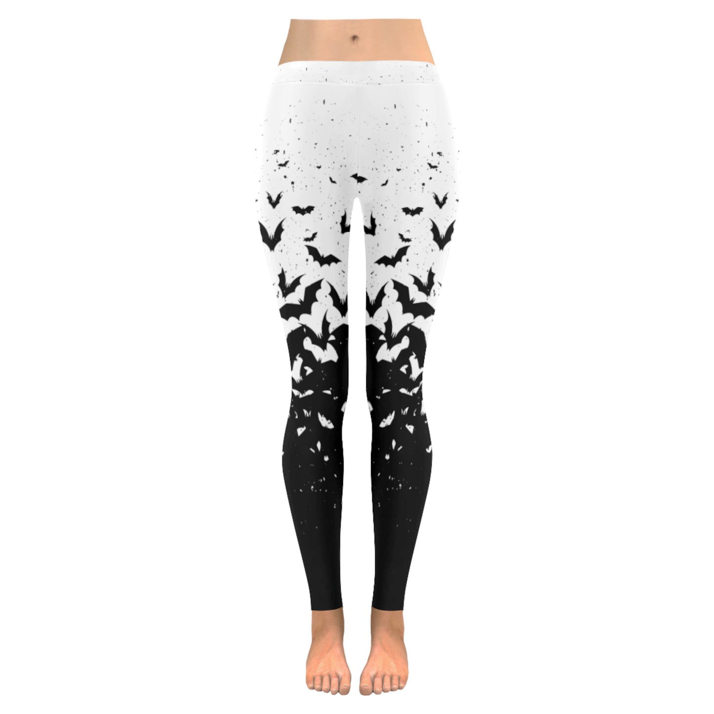 White and black pastel goth leggings displayed on clean white background.