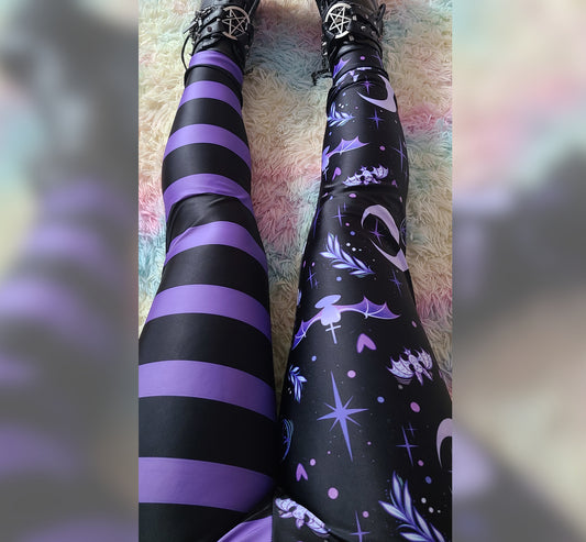 Young girl wearing a pastel goth leggings with Black and Purple Bats design