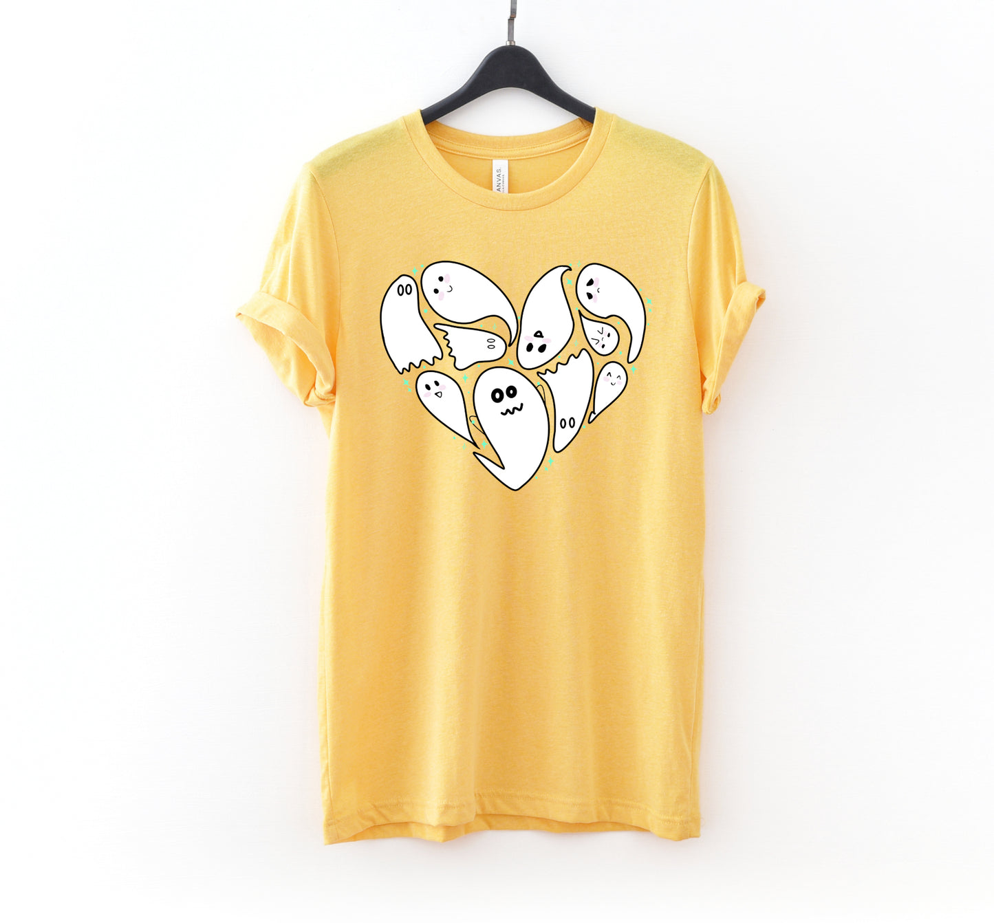 Yellow t-shirt with Halloween ghost design on a white background