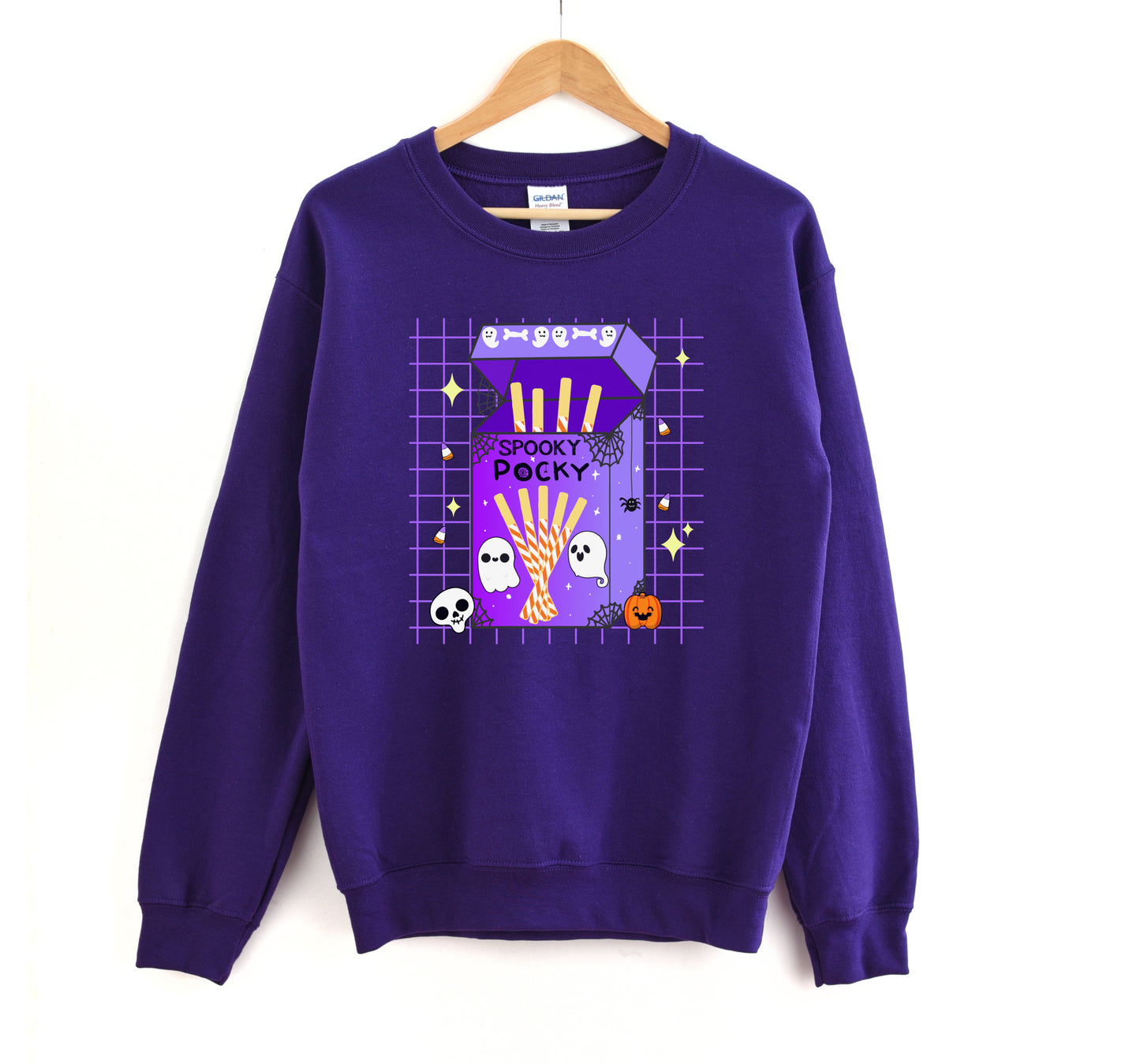 Purple sweatshirt with Halloween-themed design on a white background