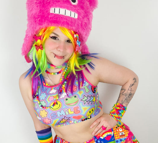 Young girl wearing kidcore Rainbowcore_Harajuku trippy rainbow love crop top