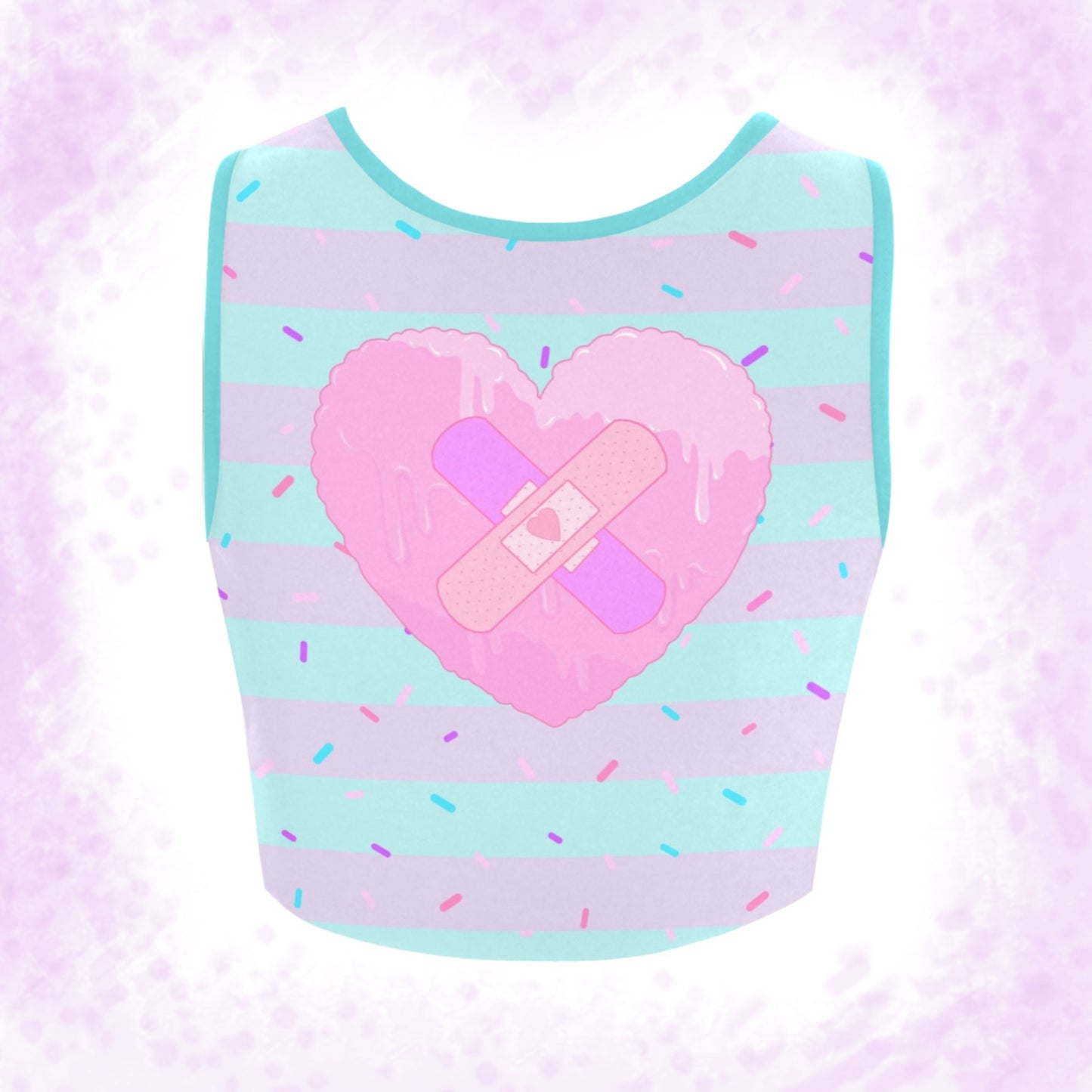 menhera Band Aid Heart Crop Top displayed on a pattern background