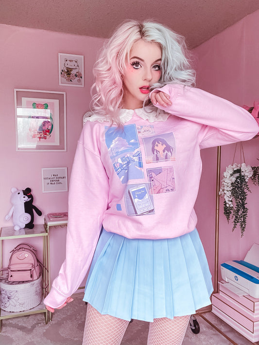 Youthful model wearing a cute kawaii sweatshirt with pastel accessories