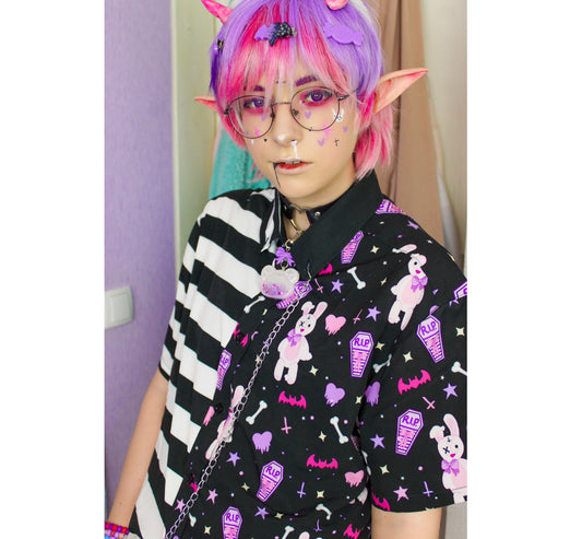 Youth model wearing a kawaii pastel goth shirt 