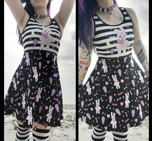 young model wearing a pastel goth dress