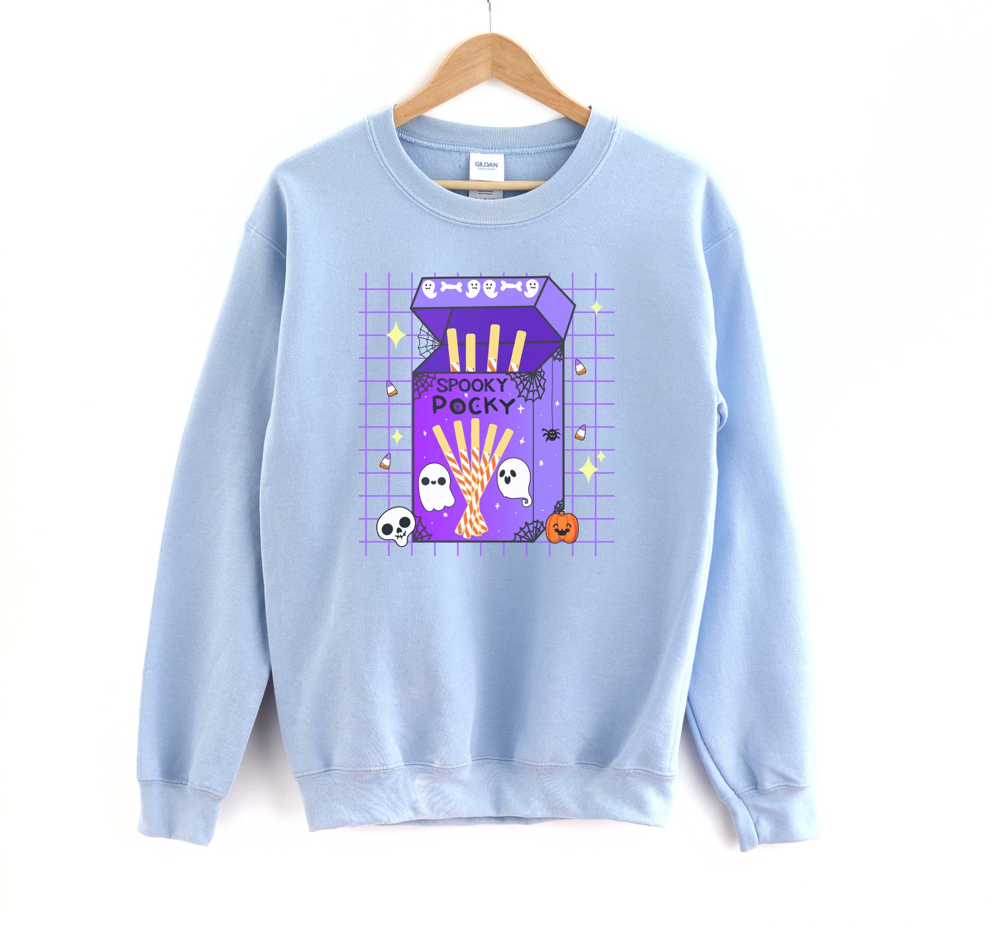 Light blue sweatshirt with Halloween-themed design on a white background