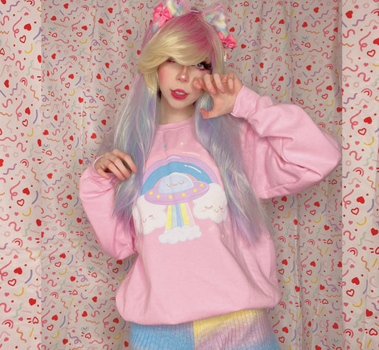 Youthful model wearing a cute kawaii sweatshirt with pastel accessories