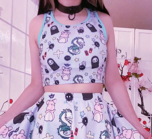 girl modeling a kawaii aesthetic crop top featuring playful, pastel artwork