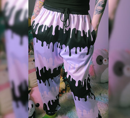 model wearing spooky pastel goth joggers 