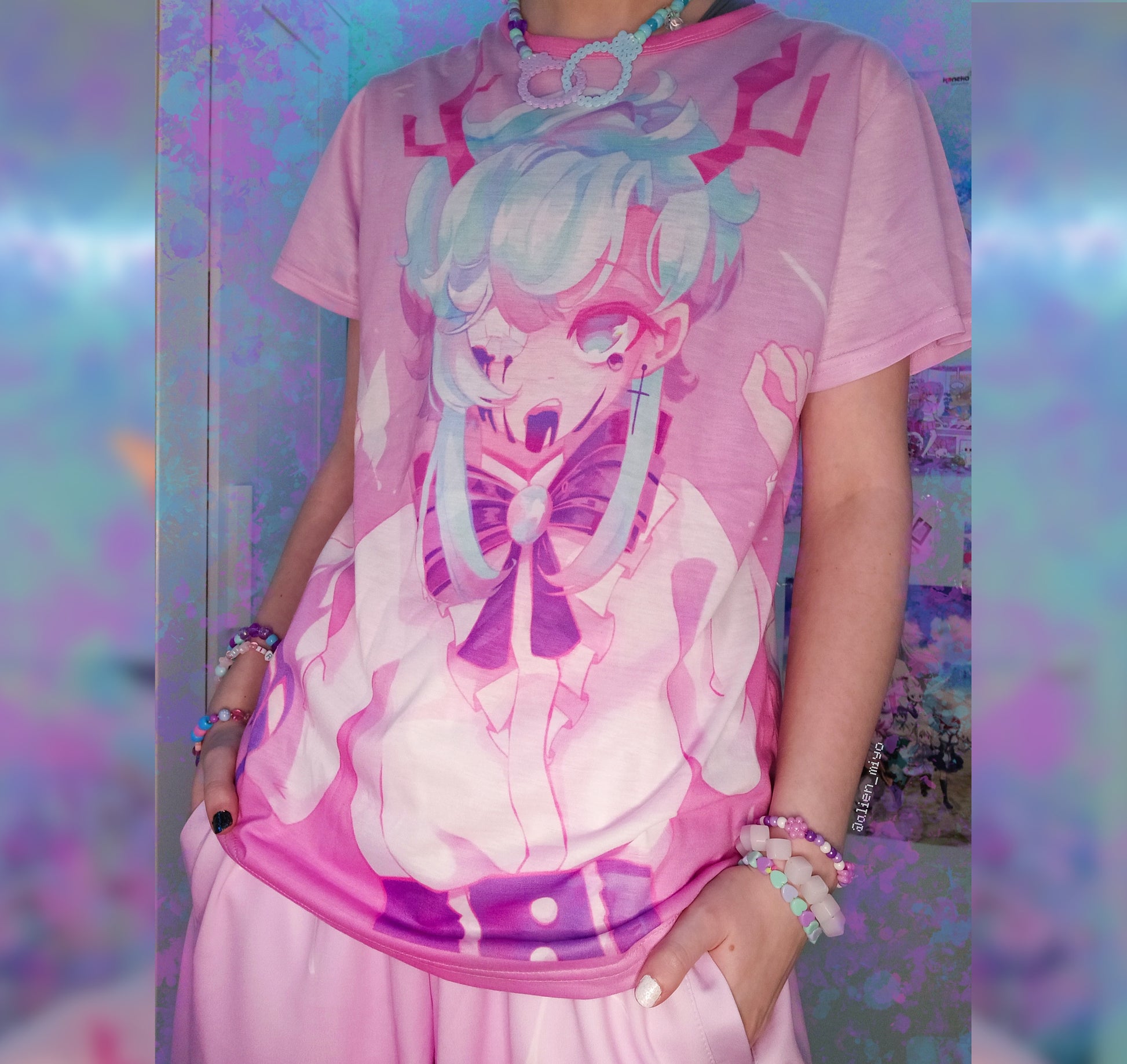 Young boy wearing a pastel spooky kawaii t-shirt 