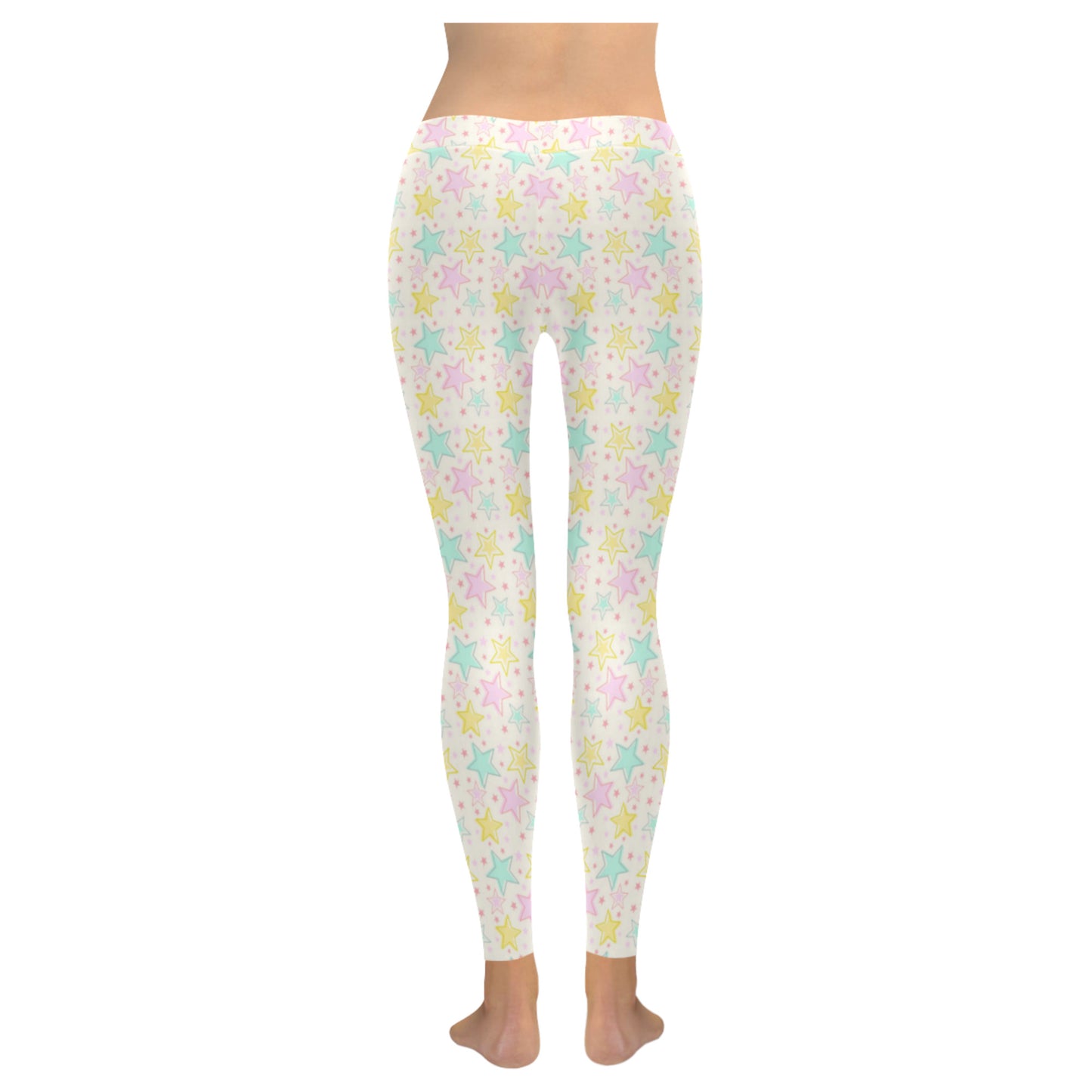 Youthful model wearing cute Yume Kawaii star leggings in pastel colours on white background