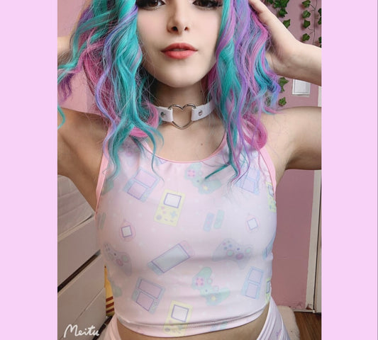 Youthful model wearing a cute kawaii crop top  with pastel accessories