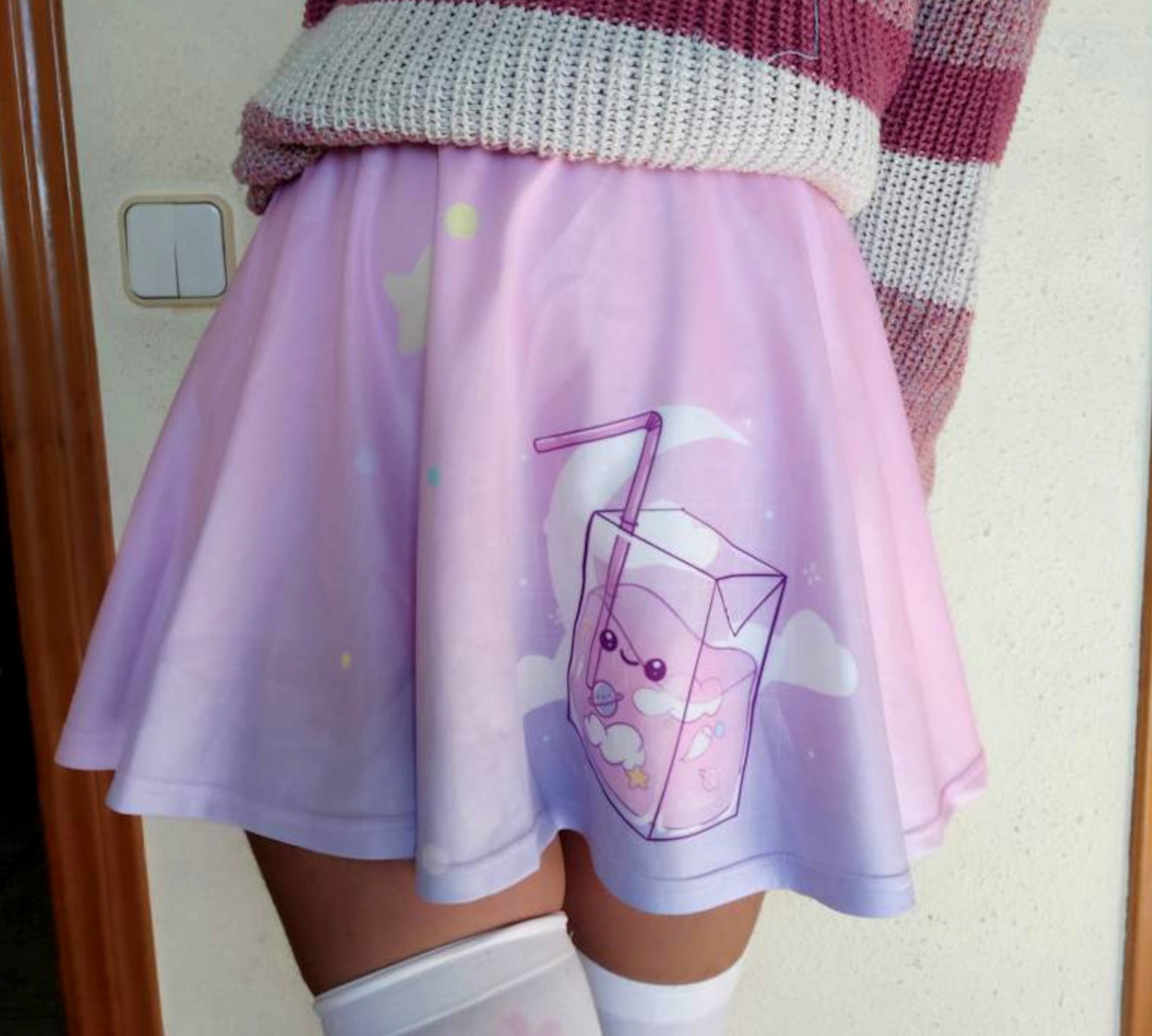 Youthful model wearing a cute kawaii skirt with pastel colours