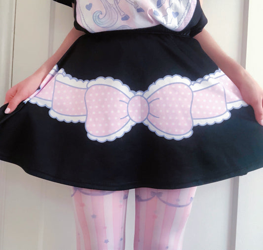 Cute girl modeling a yume kawaii black unicorn skirt featuring playful
