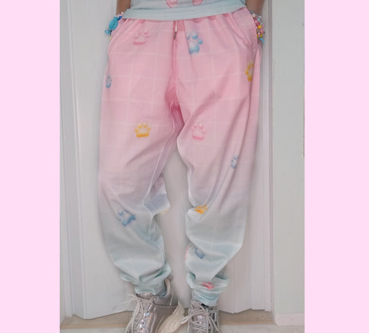 model wearing a pastel kawaii joggers with a cute print